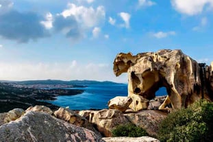 The Bear Rock (Roccia dell’Orso) perched above the Sardinian coastline, with a panoramic view of the