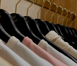 Clothes hanging symmetrically color coordinated 