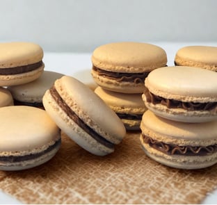 Delicious macarons filled with rich ganache in assorted flavors, beautifully crafted for gifting or special celebrations.