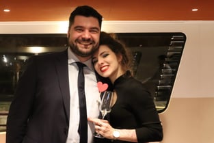 a man and woman standing next to each other