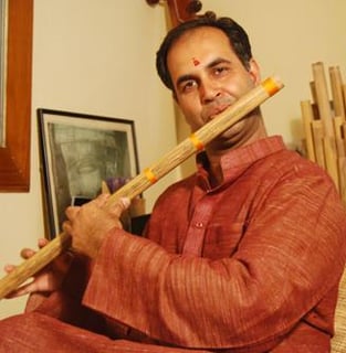 Flutist Ravi Shankar Mishra playing bamboo flute