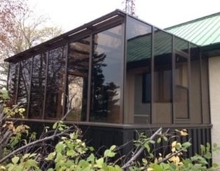 Square Eave Solarium or Lean-to solarium with pony wall and brown color.