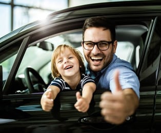  Happy customer because he just ordered a car on lease.
