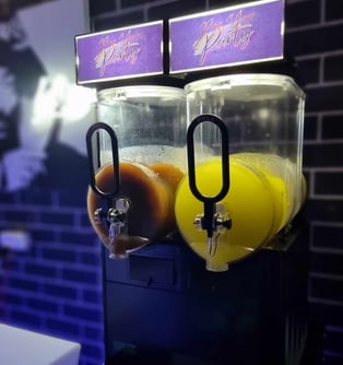 SweetAz Co. slushie machine with ice cold Cola and Pina Colada slushie at event in Redlands