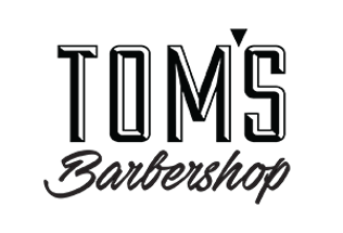 Tom's Barbershop logo