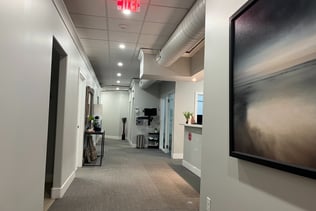 A hallway inside a clean dental office.