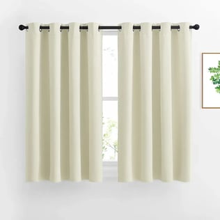 a curtain with a curtain and a window with curtains