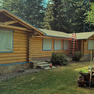 40 years of old stains removed for a fresh coat on this Log Home!