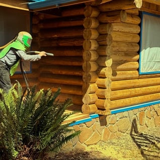 40 years of old stains removed for a fresh coat on this Log Home!