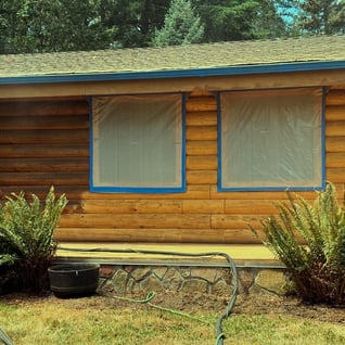 40 years of old stains removed for a fresh coat on this Log Home!