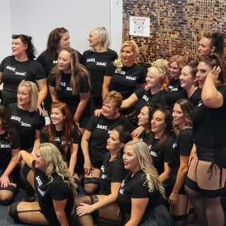 The Sass and Soul team in front of the SweetAz Co. rose gold shimmer wall hire at HOTA, Gold Coast