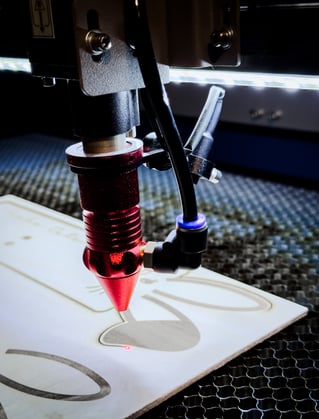 a machine that is making a laser machine