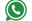 a green phone phone with a phone in the background