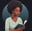 An illustration of a woman reading a book.