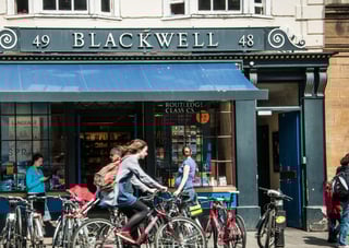 bookshop with bicycles in front