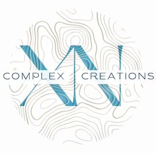 a logo for complex creations