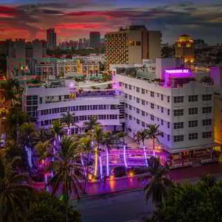 aerial night view Clevelander Hotel with a sunset in the background 