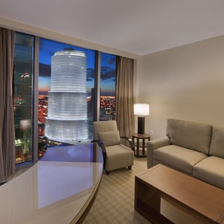 desktop in room JW Marriott Marquis Miami with miami in the background through the window 