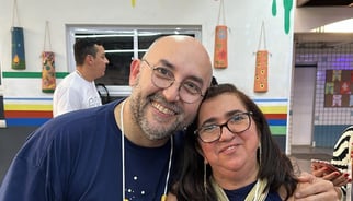 a man and woman posing for a picture
