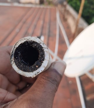 20 years worth of plaque buildup inside a pipe due to hard water.