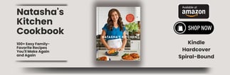 a woman in a blue shirt and white pants with a plate of food
