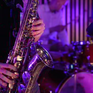 playing saxophone