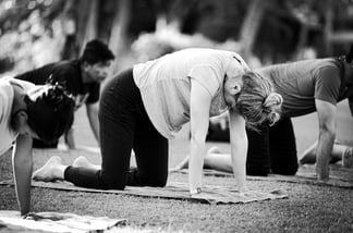 People practising yoga in a park in Langkawi, Malaysia.