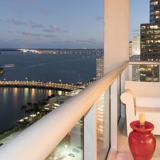 beach view from Miami Vacation Rentals - Brickell hotel at night, background buildings with many lights, the beach