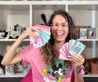 A Spanish tutor holding flashcards