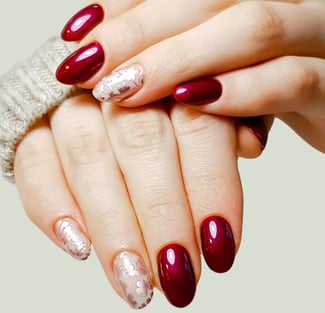 a woman's hands with a manicure and gellish