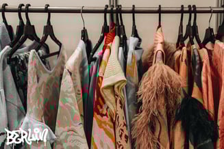 clothes hanging on a rack