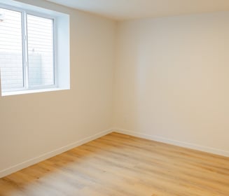 light wood colored flooring in bedroom