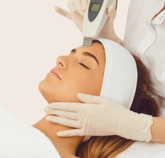 a woman getting a facial lift in a beauty salon