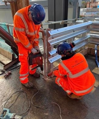 Reclaimed armco barrier on reclaimed steel posts