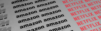 DTF textil mostrando logos impresos de Amazon, Netflix, Yamaha