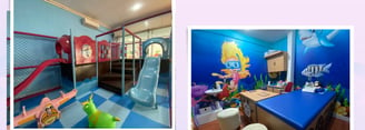 a kid's room with a play area and a play area