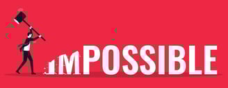 a man holding a mallet that says impossible