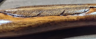 relief carved feather