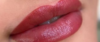 a close up of a woman's lips and lips