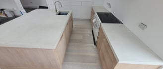 White polished concrete centre island and countertop