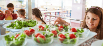 school children eating salads