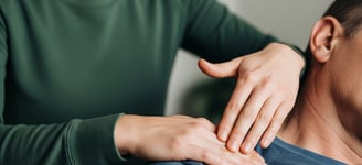 Certified instructor demonstrating hands-on vibrational energy healing techniques for chakra balanci