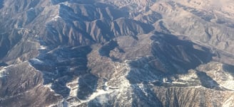 Snow at the mountain tops on the way to Las Vegas