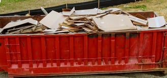 dumpster full of debris 