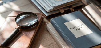 Banknote Album and Magnifying Glass