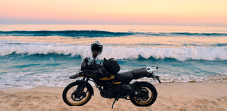 a motorcycle in the sandy beach