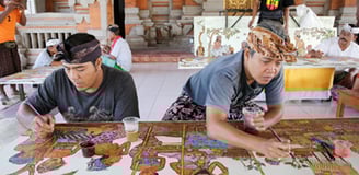 a group of people are Traditional Batik