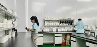 a woman in a lab coat and a man in a lab coat