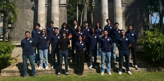 a group of people standing in front of a building