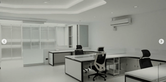 a modern office with a modern office desk and a glass wall